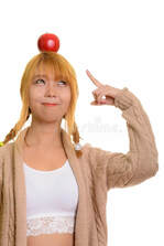 Picture of lady pointing to apple on her head. Click to download APP for iPhone.